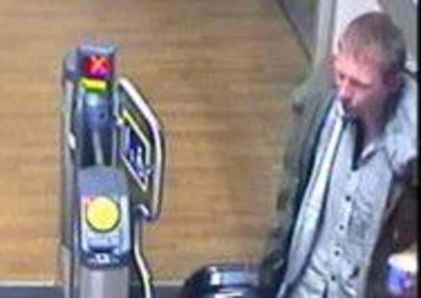 Police would like to speak to this man after a suitcase was stolen between Gatwick and Horsham