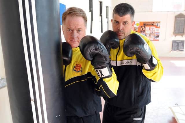 LG 040614  Steve Bailey left and Adrian Clarke at Littlehampton Amateur Boxing Club, appealing for help in getting a new base for it. Photo by Derek Martin SUS-140606-093540001