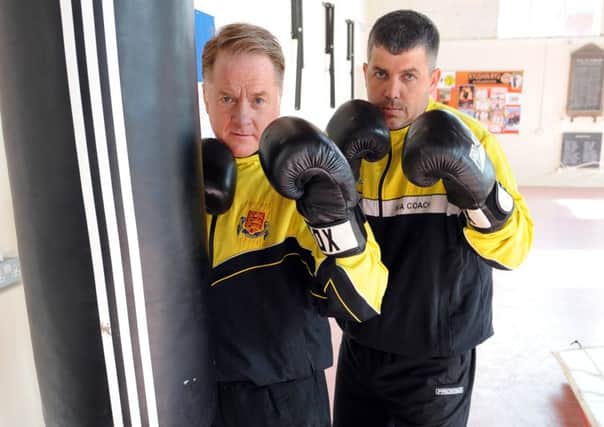 LG 040614  Steve Bailey left and Adrian Clarke at Littlehampton Amateur Boxing Club, appealing for help in getting a new base for it. Photo by Derek Martin SUS-140606-093540001
