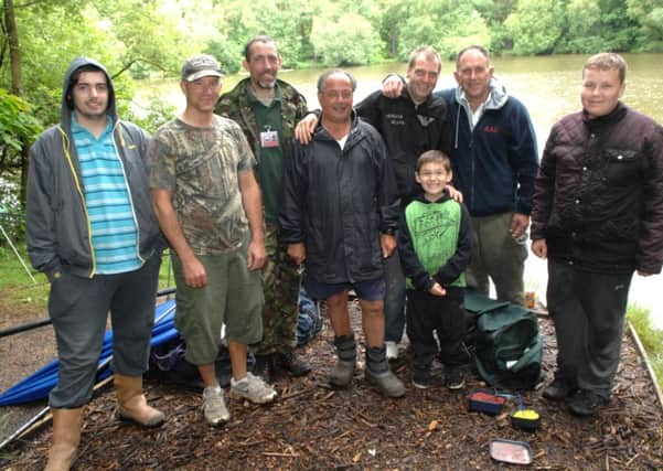 Crawley Angling teach in session at the New Pond June 2014 (Pic by Jon Rigby) SUS-140906-113624002