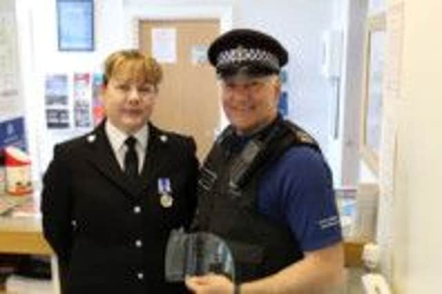 Two Battle Neighbourhood Policing Team officers have been presented with awards for their service to Sussex Police.
PC Jayne Cleverley was awarded a police long service medal and PCSO Demi Georghiou was awarded a Sussex 'Services' Award. SUS-140906-143246001