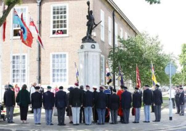 Ex-servicemen and members of the public paid their respects at a commemorative D-Day service on Friday
