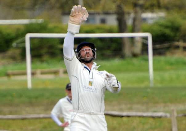 Pointing the way. Wicketkeeper/batsman Matt Shuttlewood scored a crucial half century in Slinfold's win