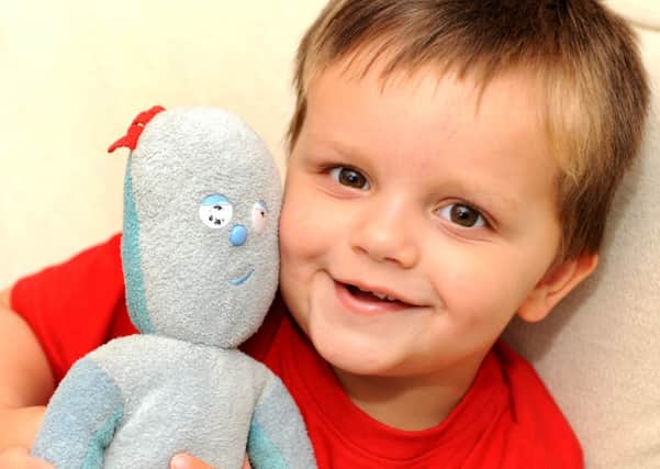 Two-year-old Joe Atkins was reunited with his teddy, Iggle Piggle. pic steve robards SUS-141006-151517001