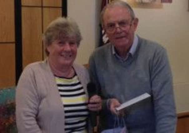 Chairman Judy McMahon with retiring Trustee David Briffett SUS-141106-095312001