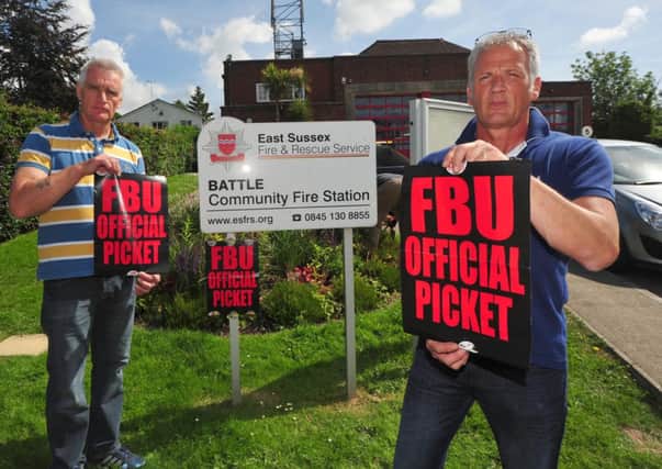 12/6/14- Firefighters Clive York and Gary Norton on the picket line at Battle Fire Station. SUS-141206-131449001