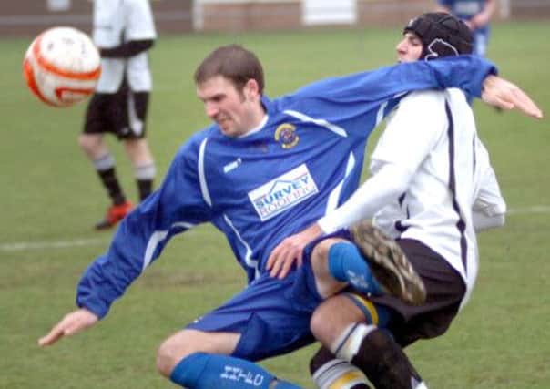 Marc Munday in the thick of the action for Bexhill United against Haywards Heath Town during his previous stint at the club