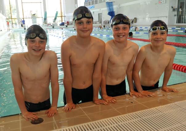 W24529H14

West Park School Swimmers. Calvin Fry Arian Taherzadeh Oliver Hodges and William LeMerle SUS-141206-153939002