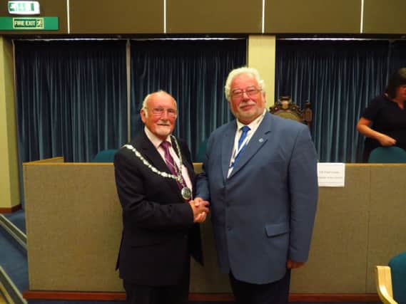 New Adur Council chairman Fred Lewis and former chairman Mike Mendoza