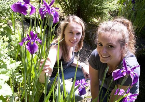 Garden design students Puck Milder and Yanou Hipp with the Iris ensarta