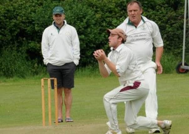 West wittering take a wicket in their clash with West Chilts   Picture by Louise Adams