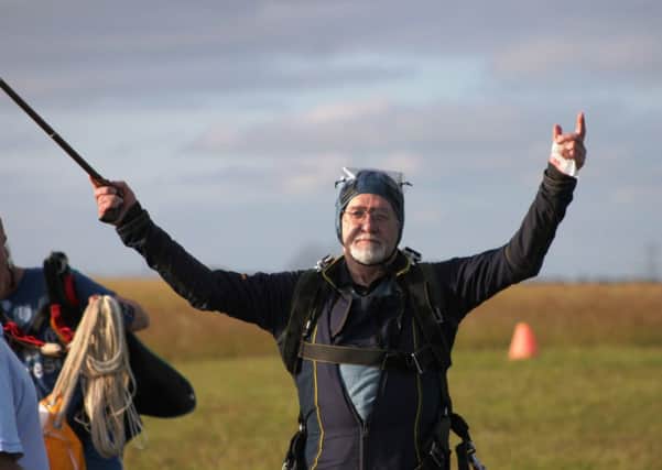 Adur councillor David Donaldson celebrates a successful landing