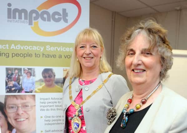 Jill Long, mayor of Littlehampton, with Impact Initiatives volunteer Valerie Narayanaswamy. The organisation needs more volunteers to swell its ranks D14221283a
