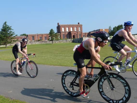 A trio of competitors tackle the bike leg in last year's Sussex Triathlon at Ashburnham Place