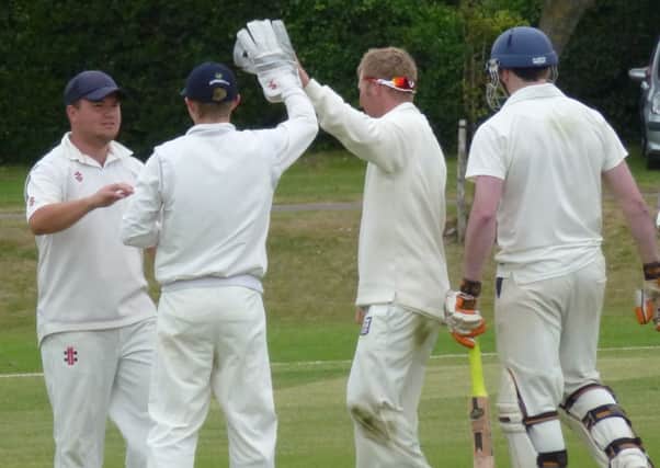 Bexhill celebrate a wicket in their victory over Brighton & Hove last weekend. Picture by Simon Newstead (SUS-140615-182315002)