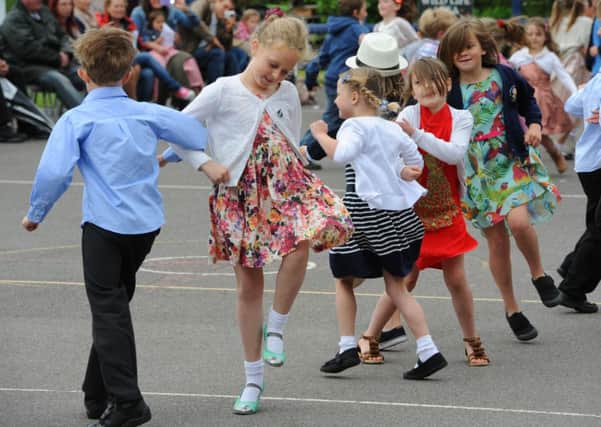 Happy pupils at St Wilfrid's Primary School