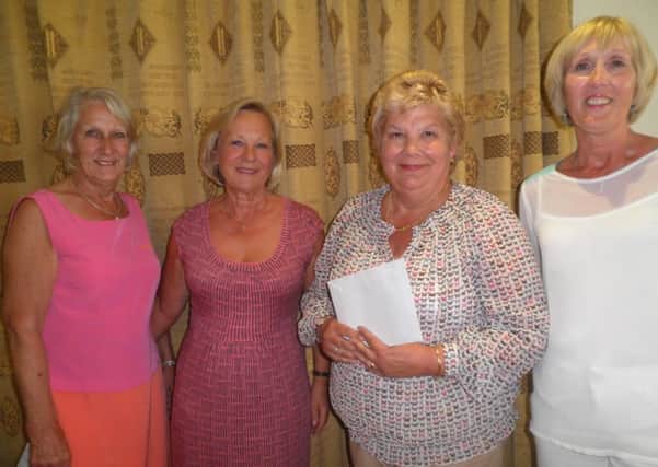 The winners, pictured with the Lady Captain, Di Beningfield, were Fee Drew (Cottesmore), Sue Ponsford (Cuckfield) and Liz Dewar (Hayward's Heath).