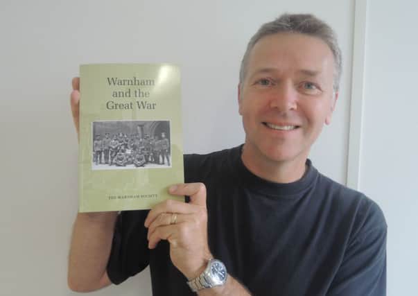 Steve Lancaster of the Warnham Society with their book, Warnham and the Great War