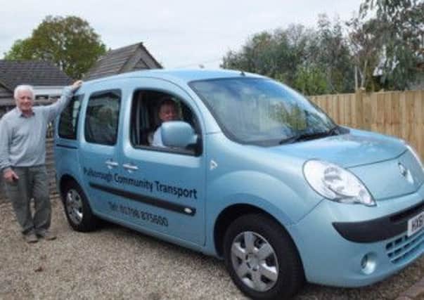 New community transport vehicle with Michael Clenshaw who runs the scheme SUS-140623-160546001
