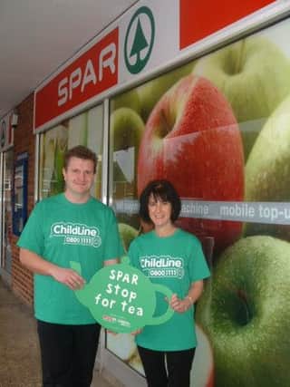 Grant Maxfield and Lisa Wass from the Horsham SPAR shop in Coltsfoot Drive, which has raised more tha £250 for the NSPCC Childline School Service - picture submitted