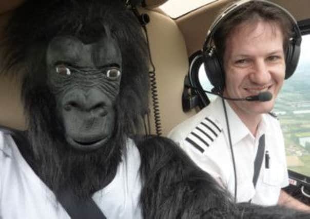 Student Seb Powderham dons the gorilla suit for the flight