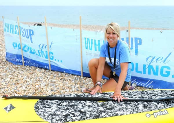 SH 240614 Kate Radford at Whatsup stand up paddle boarding, on Shoreham Beach