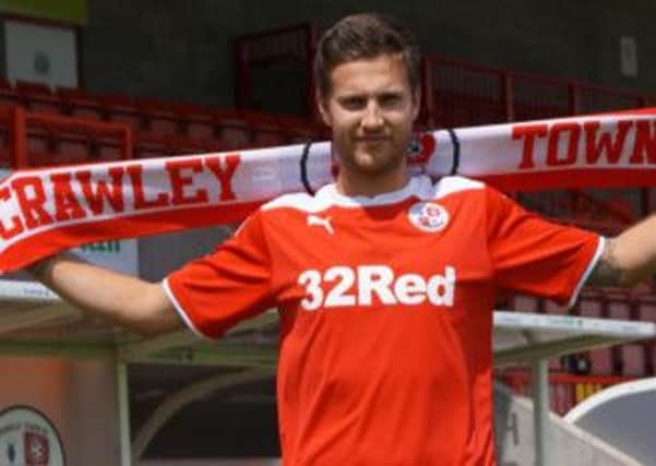 Crawley Town's new signing Conor Henderson SUS-140626-133348002