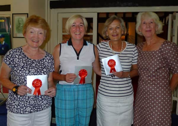 Haywards Heath Golf Club Lady Captains Prize Day winners collecting their prizes. From left: Pat Jenks, Haley McCartney, Dora McCabe and Ladies Captain, Rosemary Parvin.