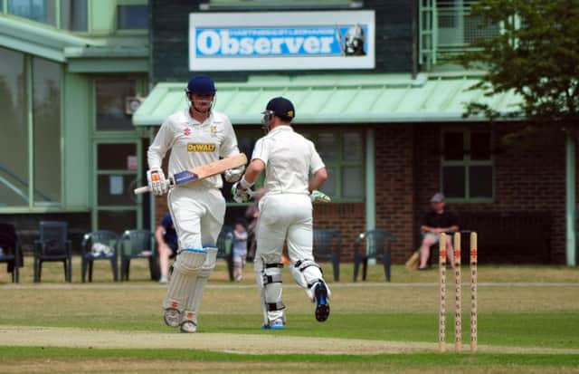 Tom Gillespie and Leo Cammish at the crease for Hastings Priory against Eastbourne. Picture by Steve Hunnisett (SUS-140628-175259002)