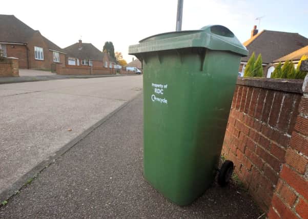 26/11/13- A green wheelie bin issued by Rother District Council for collecting garden refuse. ENGSUS00120131126115806
