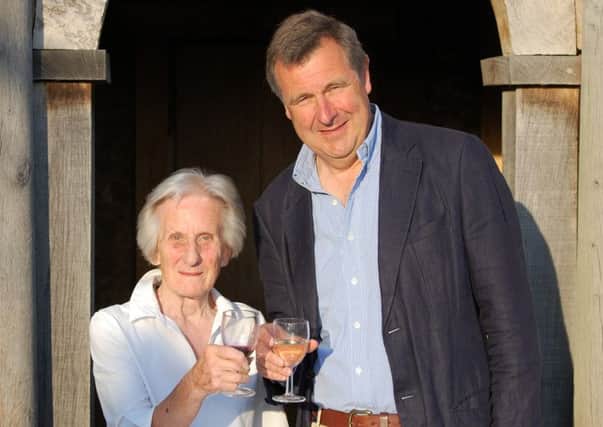 Arundel Museum Society chairman Pauline Carder and the Duke of Norfolk toast the museum's first birthday