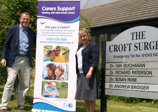 Nick Herbert MP with Jennie Musgrove Chief Executive of Carers Support West Sussex outside The Croft Surgery in Eastergate SUS-140630-120216001