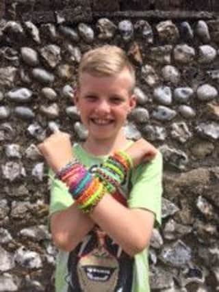 Joshua with his loom bands
