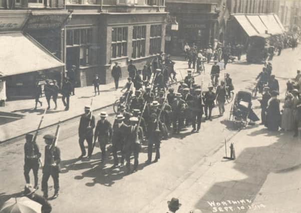 German and other enemy aliens being marched along Chapel Road, Worthing, to the town's railway station en route to internment, September, 1914