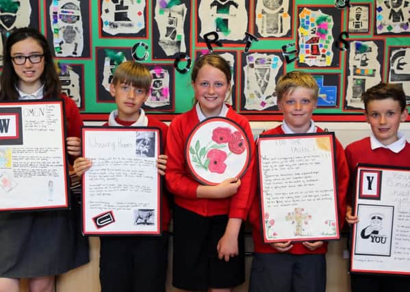 ACE pupils with their work