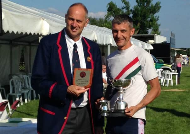 Bexhill Rowing Club talent Mark Mitchell (right) with Sir Steve Redgrave at last month's Marlow Regatta