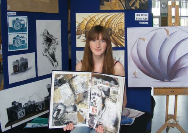 Fine art student Eloise Dilnutt, 17, with her work