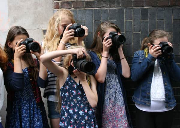 Farlington girls taking part in a photography workshop at Nikon School