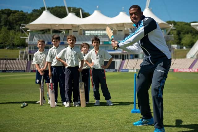 Chris Jordan gives young cricketers some batting tips at the Ageas Bowl  Picture by LMI Photography
