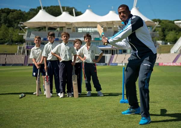 Chris Jordan gives young cricketers some batting tips at the Ageas Bowl  Picture by LMI Photography