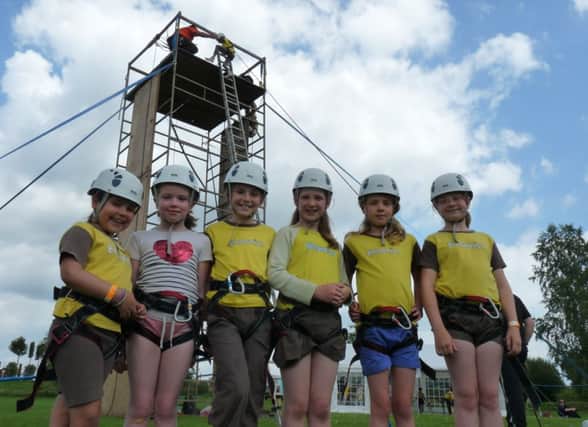 Brownies learn to abseil at the 100th birthday bash