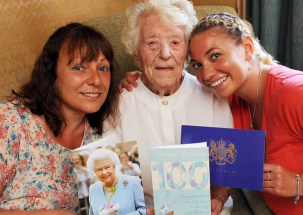 JPCT 070714 S14280740x Horsham. 100th birthday. Julie Dunn, daughter-in-law with Rene Dunn and granddaughter Natalie Dunn -photo by Steve Cobb SUS-140707-162844001