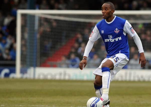 Cedric Evina in action for Oldham Pic: Oldham Chronicle SUS-140807-163429002