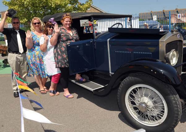 W25831H14  Classic cars added to the vintage theme of Thomas A Becket First School's summer fete