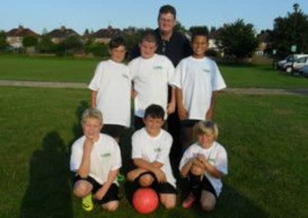 Horsham FC Under 10s team with Manager, Tony Massimo - picture submitted SUS-141007-153505001