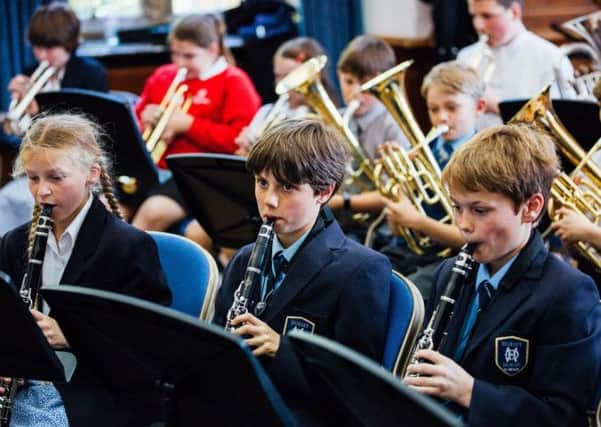 A brass and woodwind band was put together at Christs Hospital in just one day. Picture by Toby Phillips SUS-141107-094643001