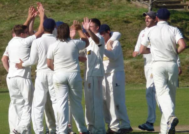 Hastings Priory celebrate claiming a Roffey wicket at Horntye Park yesterday. Picture by Simon Newstead (SUS-140713-220823002) SUS-140713-220823002