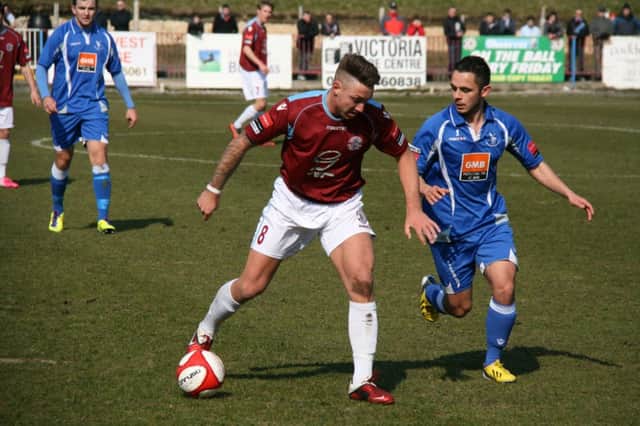 Action from the Ryman Premier Division meeting between Hastings United and Whitehawk on Easter Monday 2013