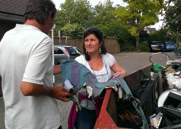Homeless man had all his belongings destroyed in a skip fire. Pictured with Maria Stack, senior support worker from ARK Horsham SUS-140716-090948001