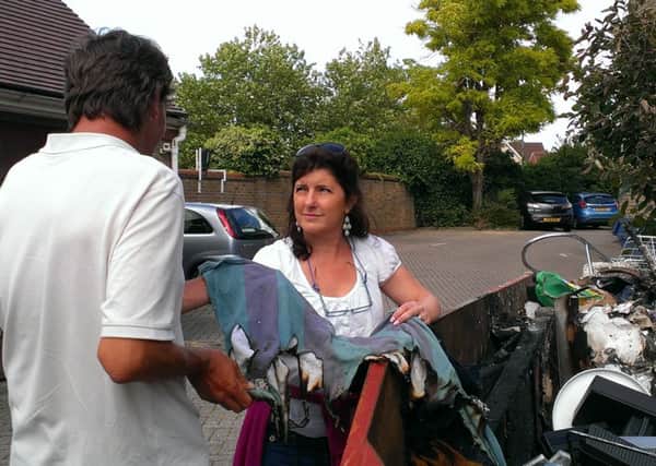 Homeless man had all his belongings destroyed in a skip fire. Pictured with Maria Stack, senior support worker from ARK Horsham SUS-140716-090959001